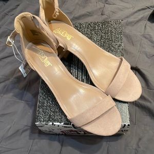 Cream color size 9 low heels.